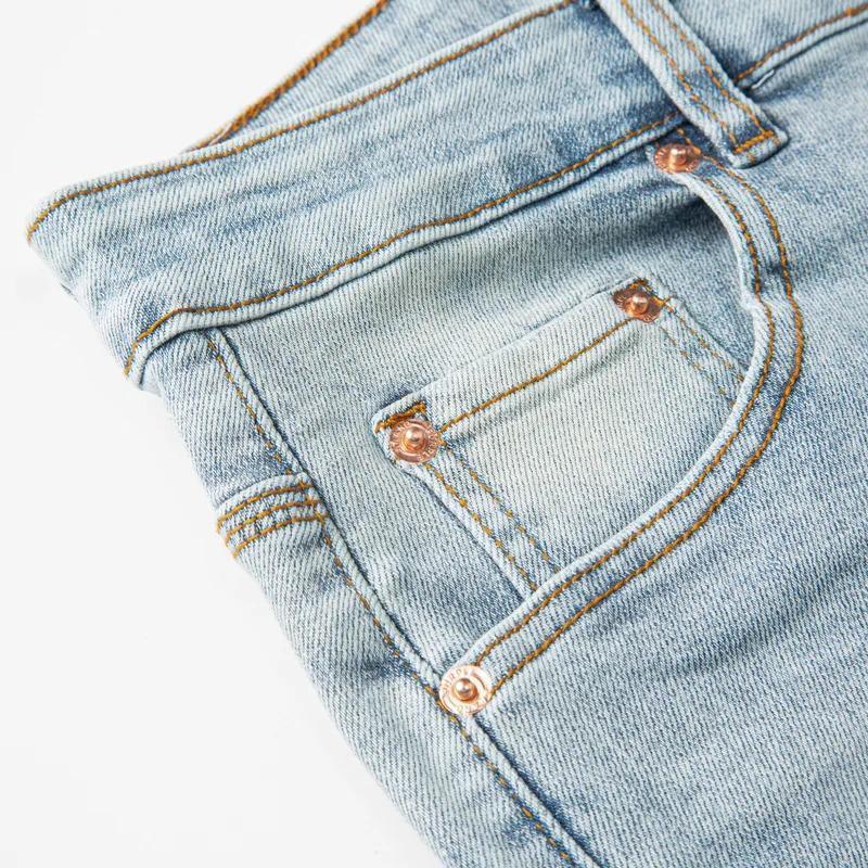 Distressed Light Wash Denim